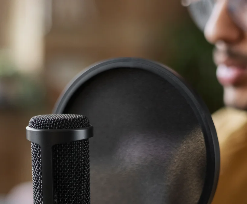 side-view-young-man-recording-podcast